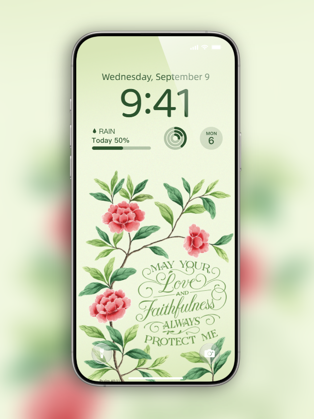 Free Christian phone wallpaper with Psalm 40:11, pink flowers, and green leaves on a phone lock screen