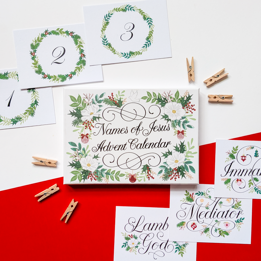 Christian advent calendar with pegs, cards, displayed brightly on red and white